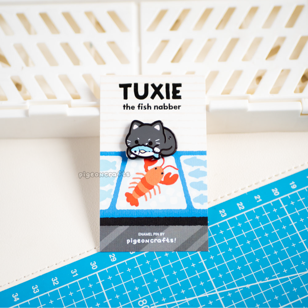 Tuxie the Fish Nabber Enamel Pin