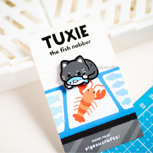 Tuxie the Fish Nabber Enamel Pin